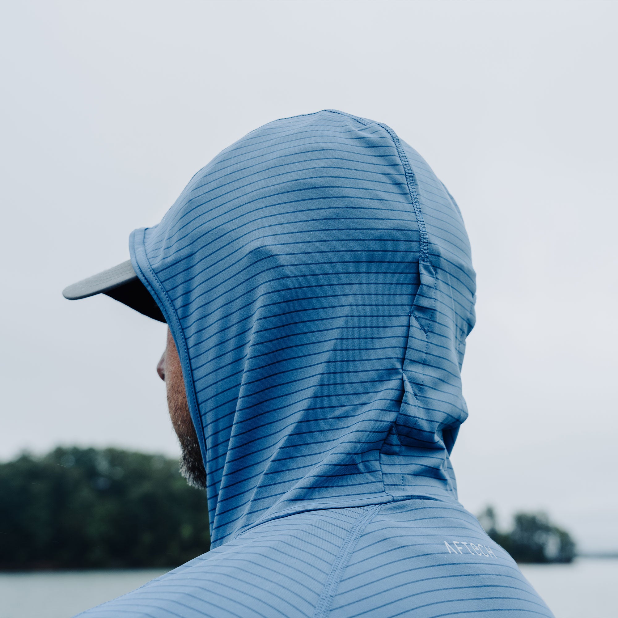 Channel Hooded Performance Shirt - Image 10